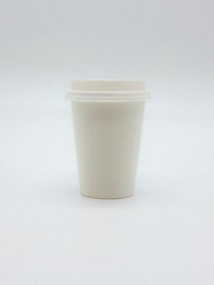 Paper Cup with Lid on White Surface